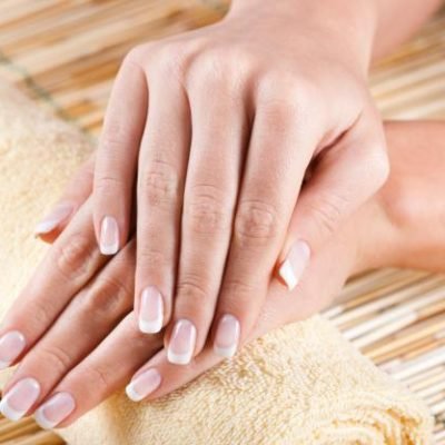 womans-hands-with-manicured-fingernails